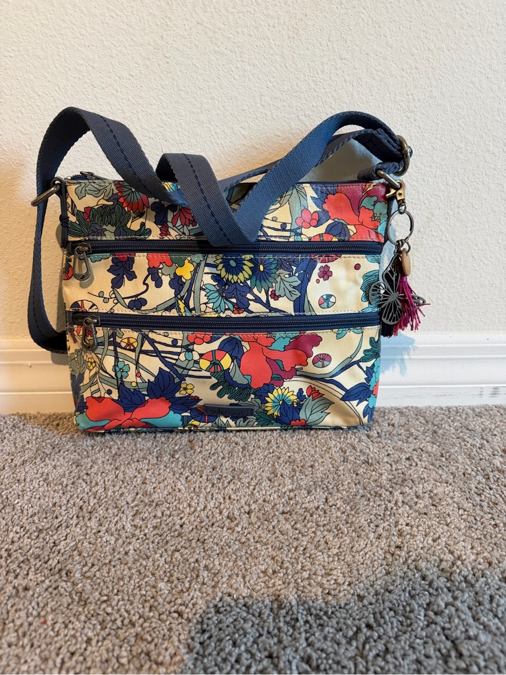 Sakroots Cream Floral Crossbody with Navy Strap